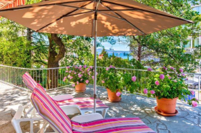 Charmantes Apartment nur 200 Meter zum Strand mit Meerblick, Liegen, Grillbereich